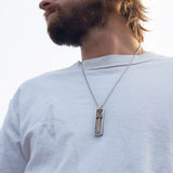 Model Wearing Petrichor ENCASED VIKING SWORD BRONZE Mens Pendant Necklace by Keith Jack